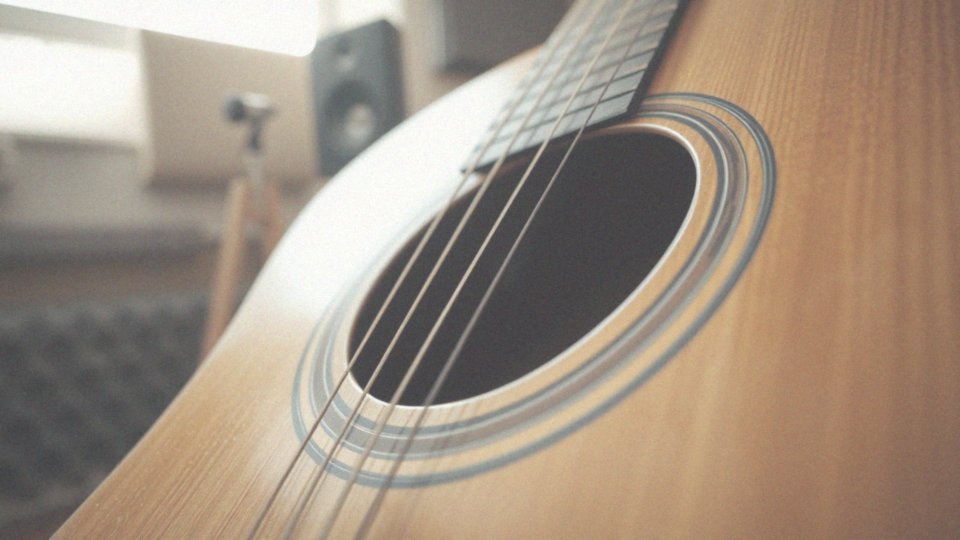 Jakie są efekty używania strun powlekanych w gitarze akustycznej?